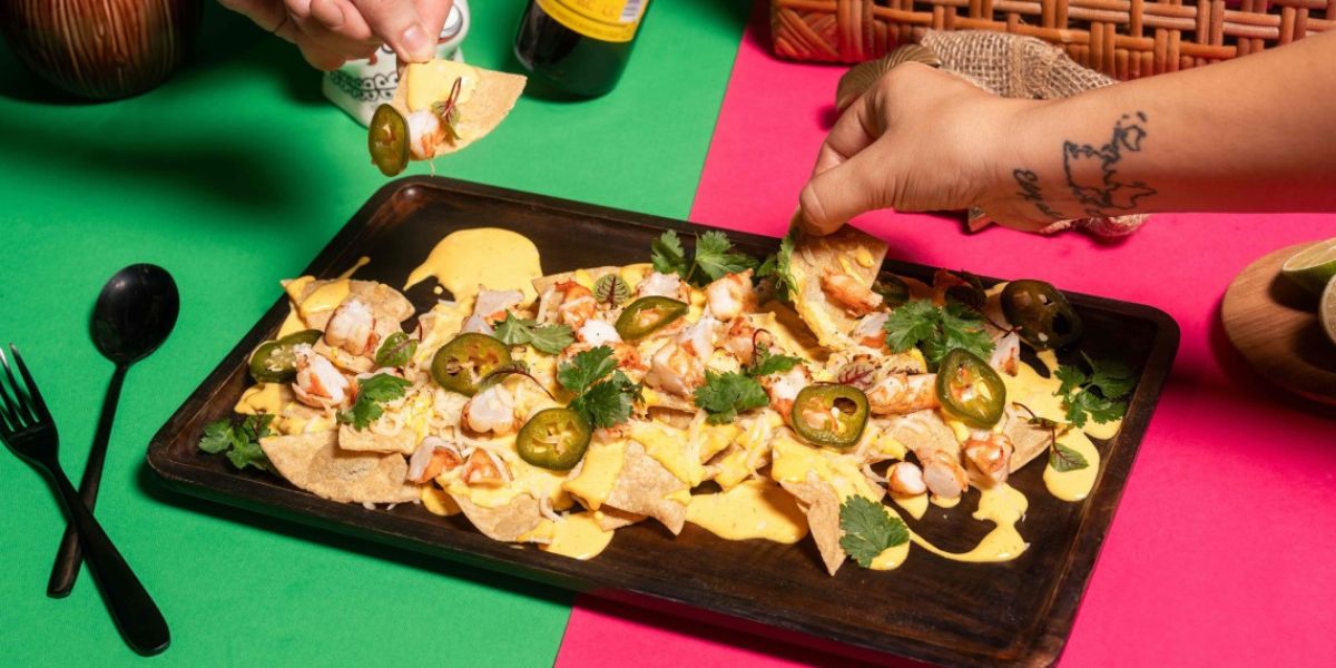 Shrimp nachos with cheese and jalapeños